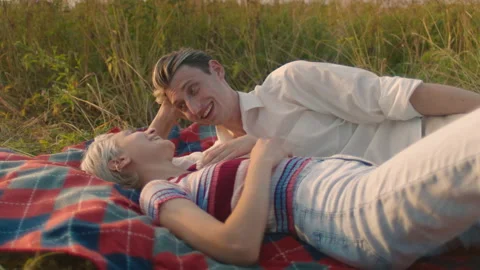 Authentic young couple on romantic picnic date Stock Footage 162545120