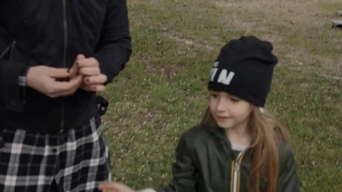 Authenticity kid offering flower mommy Stock Footage 74083334