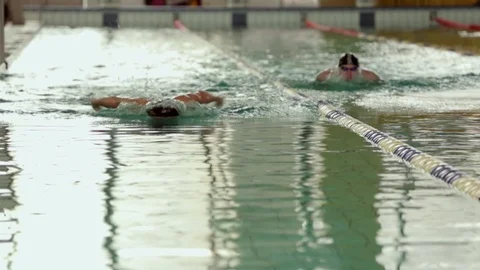 Authlets training in swimming pool Stockbeeldmateriaal 89803010