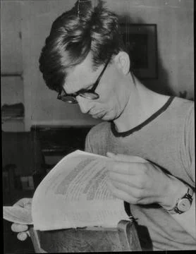 Author Colin Wilson Studies The Script Of His Latest Play ' The Metal Flower Blo Stock Photos