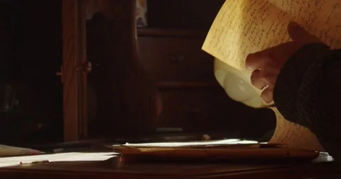 Author is looking through his writings Stock Footage 218749607
