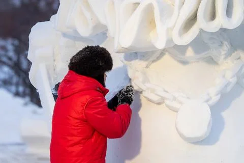 The author is a sculptor who makes elements of a manege sculpture in the wi.. Stock Photos