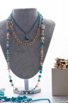 Author set with different blue colors  necklaces  presented on maneken agai.. Stock-Fotos