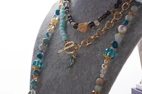 Author set with different blue colors  necklaces  presented on maneken agai.. Foto stock