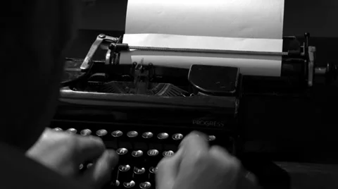 Author typing on a typewriter, black&amp;white 2 Stock-Footage 29655085