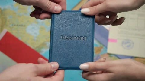 Authority representative offers Indonesian passport to citizen with biometric Stock Footage 331263182