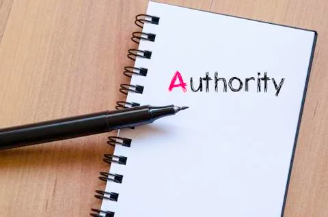 Authority text concept on notebook Stock Photos