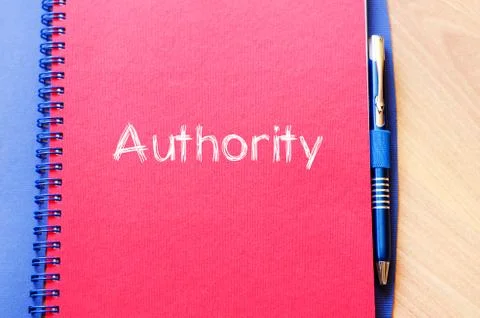 Authority text concept on notebook Stock Photos