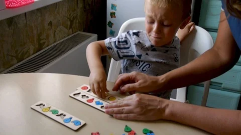 The autistic boy is naughty and does not want to engage Stock Footage 114742308