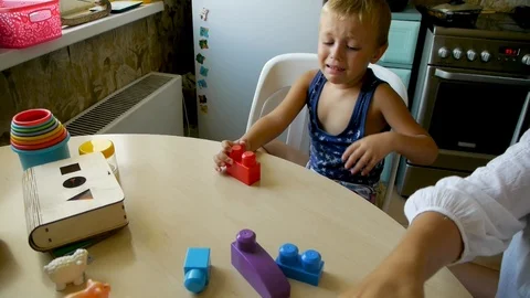 Autistic child collects constructor Stock-Footage 114572647