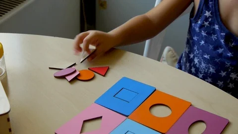 Autistic child puzzles close up Stock-Footage 114572870