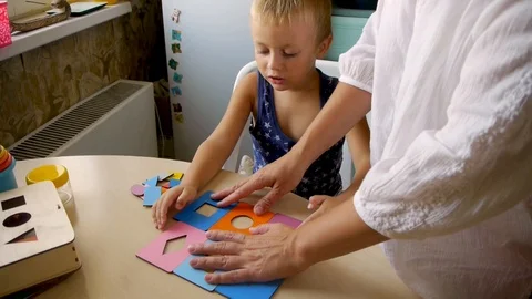 Autistic child puzzles Stock Footage 114573023