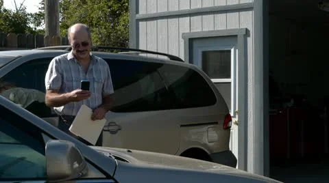 Auto adjuster smart phone1 Stock Footage 8998223