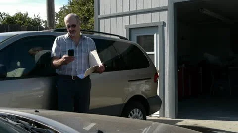 Auto adjuster using smart phone Stock Footage 8998279