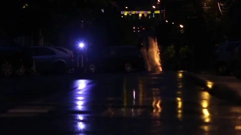 Auto and pedestrian traffic in one evening in May after a brief rain Stock Footage 60397359