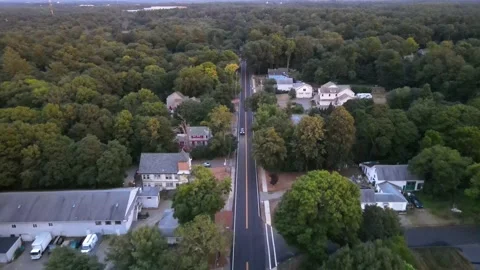 Auto Black Dark Suv Straight Follow From Front Smooth Into Overhead Drone Fly Stock Footage 137422341