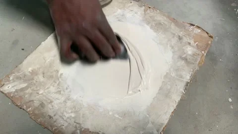 Auto body painter putty mixing on the wooden cardboard Stock-Footage 160990470