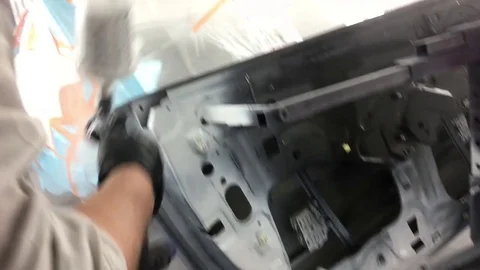 Auto Body Painter Spraying Door Video stock 81376160
