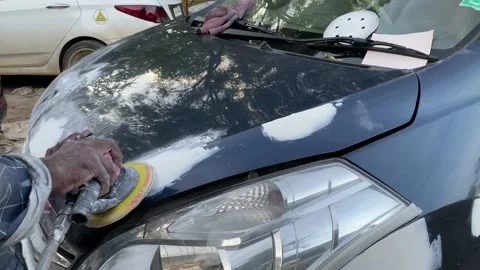 Auto body repairing process, Professional mechanic removes dents on the car body Stock Footage 158941764