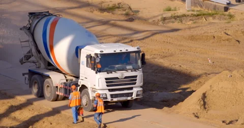 Cement Pouring From A Mixer Truck Chute High-Res Stock Photo