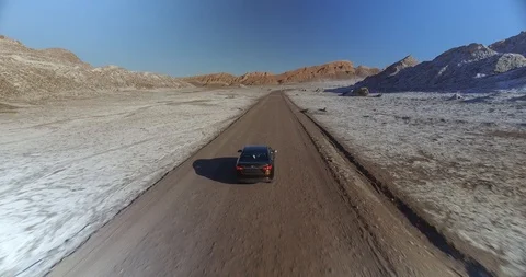 AUTO EN VALLE DE LA LUNA - ATACAMA Stock Footage 89229211