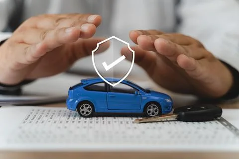 Auto insurance protection and accident prevention concept with two hands sh.. Stock Photos