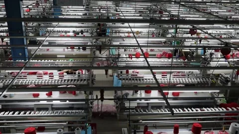 Auto knitting workshop producing sweaters for export Stock Footage 159055730