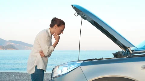 Auto lady have problems with car in nature. Stock Footage 305321132