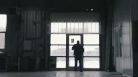 Auto Mechanic. Car Service Worker Leaves The Garage. Slow Motion Video stock 124807558