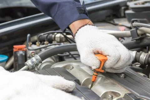 Auto mechanic check engine car Stock Photos