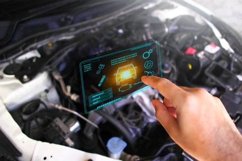 Auto mechanic checking ECU engine system with OBD2 wireless scanning tool Stock Photos