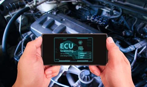 Auto mechanic checking ECU engine system with OBD2 wireless scanning tool Stock Photos