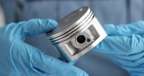 Auto mechanic checks automobile engine piston. Stock Footage 170714820