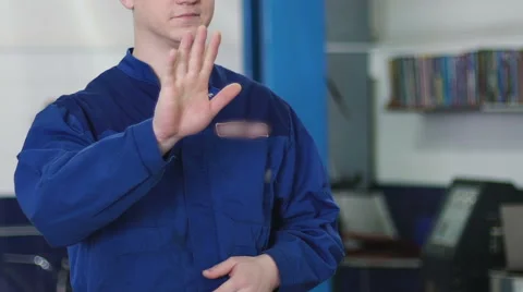 Auto mechanic is giving instruction to driver at car service station Stock Footage 63487981
