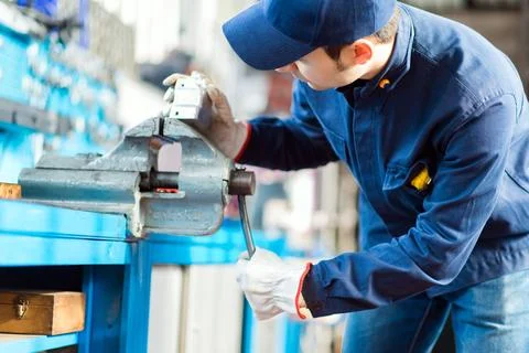 Auto mechanic in his workshop Stock Photos