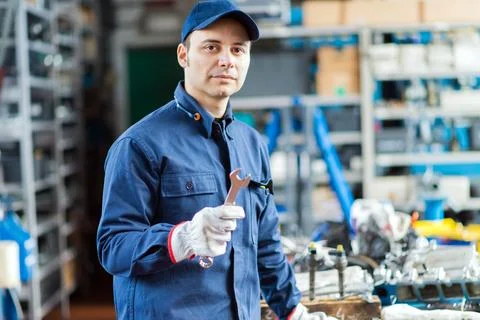 Auto mechanic in his workshop Stock Photos