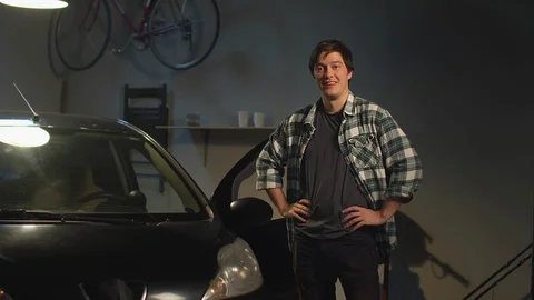 Auto mechanic in his workshop. Work on camera Stock Footage 128181096
