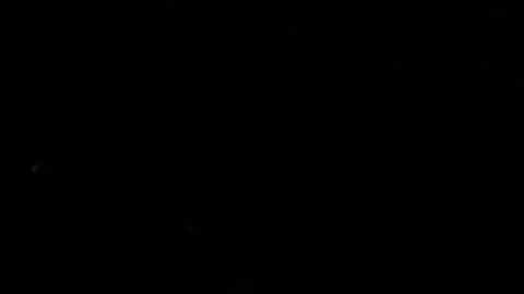 Auto mechanic lights the autogenous before reparing motorcycle Stock Footage 82982255