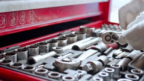 Auto mechanic pulls out a tool Stock Footage 158506475