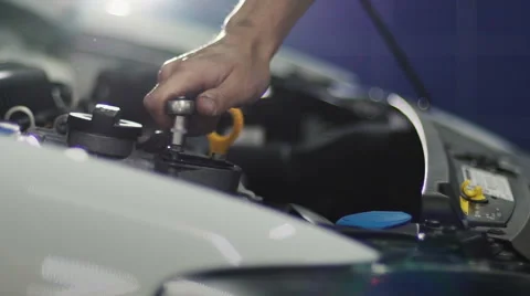 Auto mechanic repair engine at car repair shop. Slow motion Stock Footage 63447619