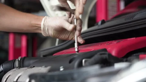 Auto mechanic repairs car engine. car service. close-up. Видео 203981554