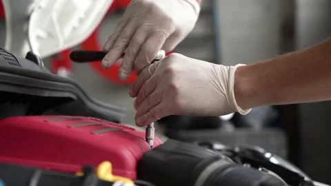 Auto mechanic repairs car engine. car service. close-up. Stock Footage 203981650