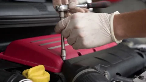 Auto mechanic repairs car engine. car service. close-up. Stock Footage 204083774