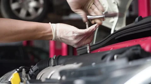 Auto mechanic repairs car engine. car service. close-up. Stock Footage 204879004