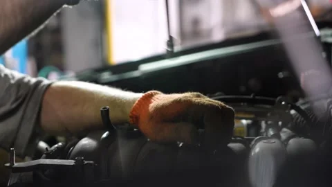 Auto mechanic repairs car engine. car service. auto repair shop Stock Footage 205232552