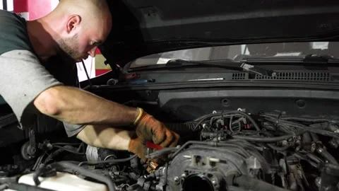 Auto mechanic repairs car engine. car service. auto repair shop. close-up Stock Footage 205510400