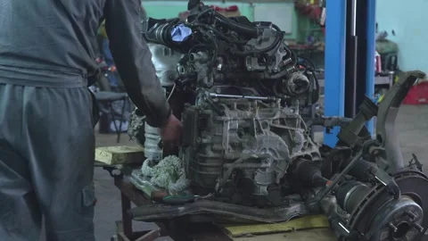 Auto mechanic repairs car engine. Auto mechanic work in car service. Car repair. Video stock 316252354