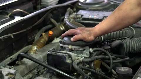Auto mechanic working on car engine Stock Footage 163168285