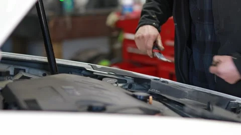 Auto Mechanic Working under Hood Stock Footage 244361584
