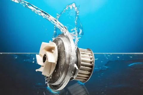 Auto parts, engine cooling pump in water splash on blue background Auto pa... Foto stock